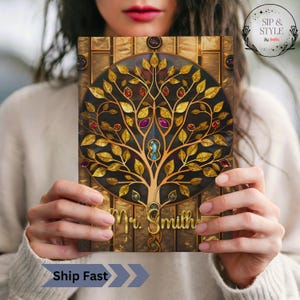 May include: A rectangular notebook featuring a gold-toned tree illustration with metallic leaves and embedded colorful gemstones set against a dark circular background. The name Mr. Smith is printed in gold script at the bottom of the cover.