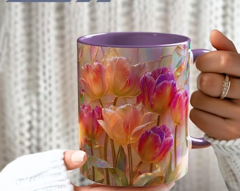 May include: A ceramic mug with a purple interior and handle, featuring a vibrant, stained-glass style illustration of pink, orange, and yellow tulips. The design includes gold-toned outlines and iridescent highlights throughout the floral pattern.
