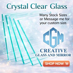 May include: Stack of crystal clear glass sheets with a teal edge. The image includes the text "Crystal Clear Glass", "Many Stock Sizes or Message me for your custom size.", and the logo for Creative Glass and Mirror.