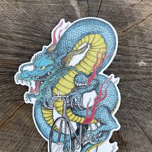 Dragon on Bicycle Sticker - Durable Vinyl Decal (4.13" x 6")
