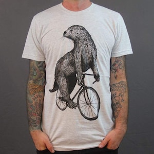 Otter Riding Bicycle T-Shirt: Hand Screen Printed Unisex Tee