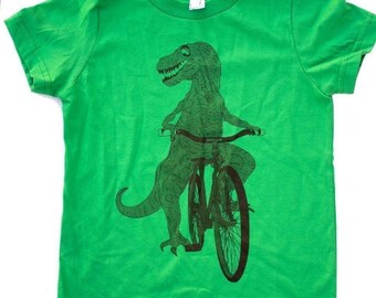 Dinosaur on a Bicycle- Kids T Shirt, Children Tee, Cotton Tee, Handmade graphic tee, sizes 2-12