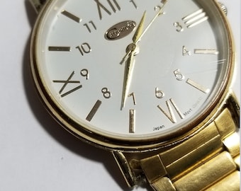 Watch Cambridge Quartz, Gold and White Dial, Band Bracelet Gold Tone Unisex  Design and is Working