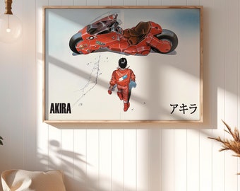 May include: A framed poster with a red and white motorcycle and a character in a red and white suit. The poster has the text "AKIRA" and "アキラ" on it.