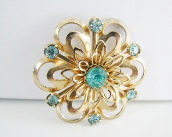 Vintage gold flower brooch with aqua blue rhinestones (G3)