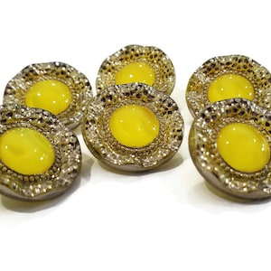 Profile photo of six 1950s moon glow glass buttons, showing the thickness and high quality of the glass.