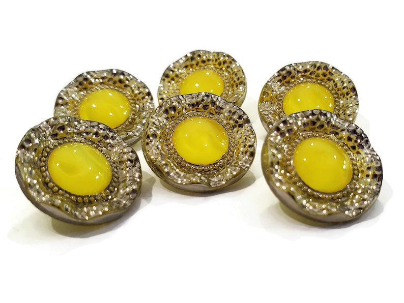 Profile photo of six 1950s moon glow glass buttons, showing the thickness and high quality of the glass.