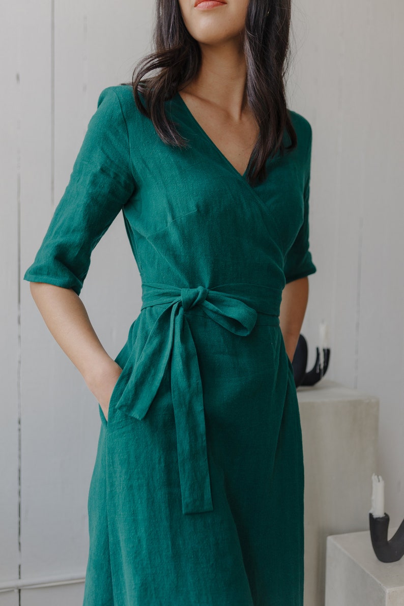 Kai & Klo Emerald green wrap dress. Linen dress with sleeves, pockets and belt.