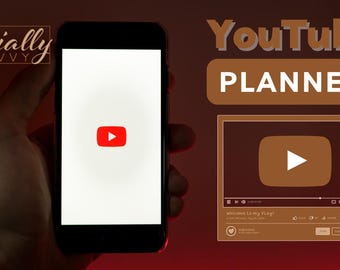 May include: A hand holding a smartphone with the YouTube logo on the screen. The text "YouTube PLANNER" is displayed in a brown rectangle above the phone. A smaller rectangle below the phone shows a YouTube video player with a play button.