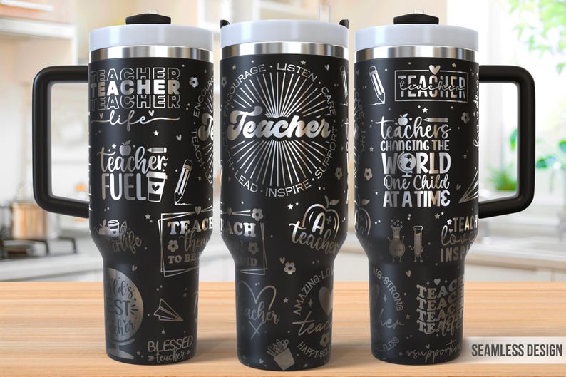 May include: Black stainless steel travel mug with a silver design featuring the words "Teacher" and "Teacher Fuel". The mug has a handle and a lid.