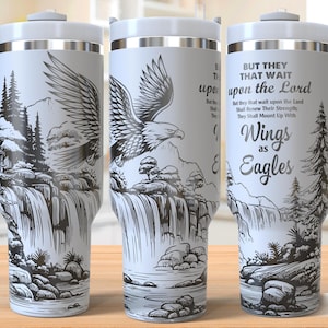 May include: White travel mug with a black and white illustration of a waterfall and an eagle with the text "But they that wait upon the Lord shall renew their strength; they shall mount up with wings as eagles."
