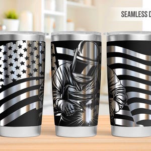 May include: A stainless steel tumbler featuring a black and silver American flag design and a welder wearing a welding mask. The tumbler has a seamless design.