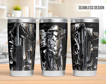 May include: A stainless steel tumbler with a black and white graphic design of a cowgirl riding a horse in a desert landscape with cacti. The design is seamless and wraps around the entire tumbler.