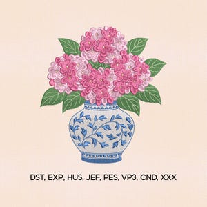May include: An embroidered design of a vase filled with pink hydrangea flowers and green leaves. The vase is white with blue floral patterns. The background is a light beige color. The text at the bottom reads: DST, EXP, HUS, JEF, PES, VP3, CND, XXX.