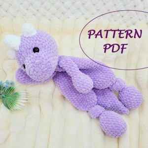 Padrão de brinquedo de amigurumi de dinossauro, dragão e pelúcia.