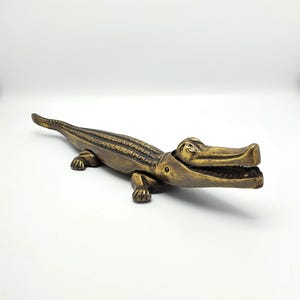 Vintage grote metalen krokodilnotenkraker jaren 1920 – antiek gietijzer, decoratief verzamelobject