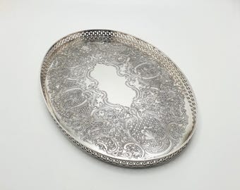 Nice Silver Plated Oval Serving Tray with Intricate Embossed Scrolls – circa 1930