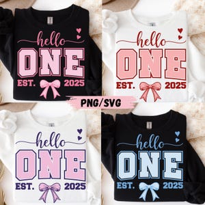 May include: Four sweatshirts with the text "hello ONE" in various colors: pink, blue, and white. Each design includes a bow and the year "2025". The words "PNG/SVG" are also visible.