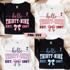 May include: Four sweatshirts with the text "hello THIRTY-NINE EST. 1987" in various colors. The sweatshirts are black, white, and the text colors are pink, blue, and red. A bow graphic is below the text.