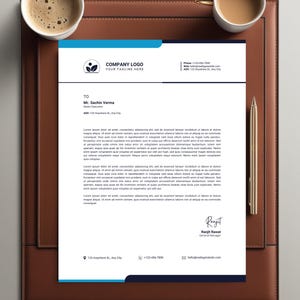 May include: A blue and white business letterhead with a company logo, a green leaf design, and the text "COMPANY LOGO" and "YOUR TAGLINE HERE". The letter is addressed to Mr. Sachin Verma, Senior Executive, at 123, Ary City. The letter includes a signature from Ranjit Rawat,  and contact information for the company.