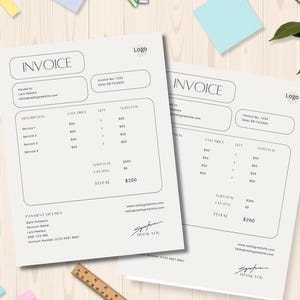 May include: Two invoices with the word "INVOICE" at the top. The invoices have a light beige background with black text. The invoices include sections for description, unit price, quantity, and subtotal. A pencil, ruler, and sticky notes are also in the image.