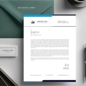 May include: A blue and white business letterhead template with a company logo, contact information, and a sample letter. The letterhead includes the text "COMPANY LOGO" and "YOUR TAGLINE HERE".