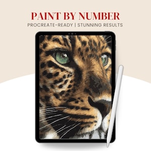 May include: A digital artwork of a leopard's face displayed on a tablet. The leopard has green eyes and a brown and tan coat. The tablet is black, with a white stylus beside it. Text at the top reads "PAINT BY NUMBER" and "PROCREATE-READY | STUNNING RESULTS."