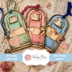 May include: Three vintage-style tags in shades of blue, pink, and green, resembling mailboxes. Each tag features a pocket filled with aged paper ephemera, keys, and heart-shaped embellishments. The tags are tied with ribbons and cords, perfect for junk journals.