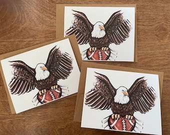 Pack of 3 greeting cards of Philadelphia eagles carrying a heart football Valentine’s Day Philly sports fan swoop mascot bleed green