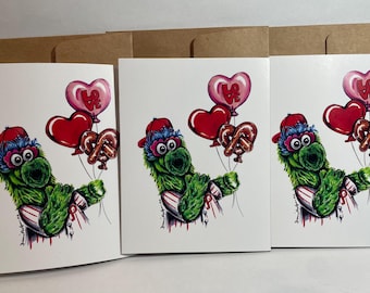 Pack of 3 greeting cards of Philadelphia’s favorite baseball mascot Phillies Phanatic holding love balloons and a Philly pretzel balloon