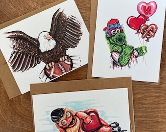 Pack of 3 assorted Philly mascot Valentine’s Day greeting cards 1 gritty heart card 1 eagles heart card 1 Phanatic balloon Philly sport fan