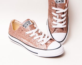 ladies white and rose gold converse