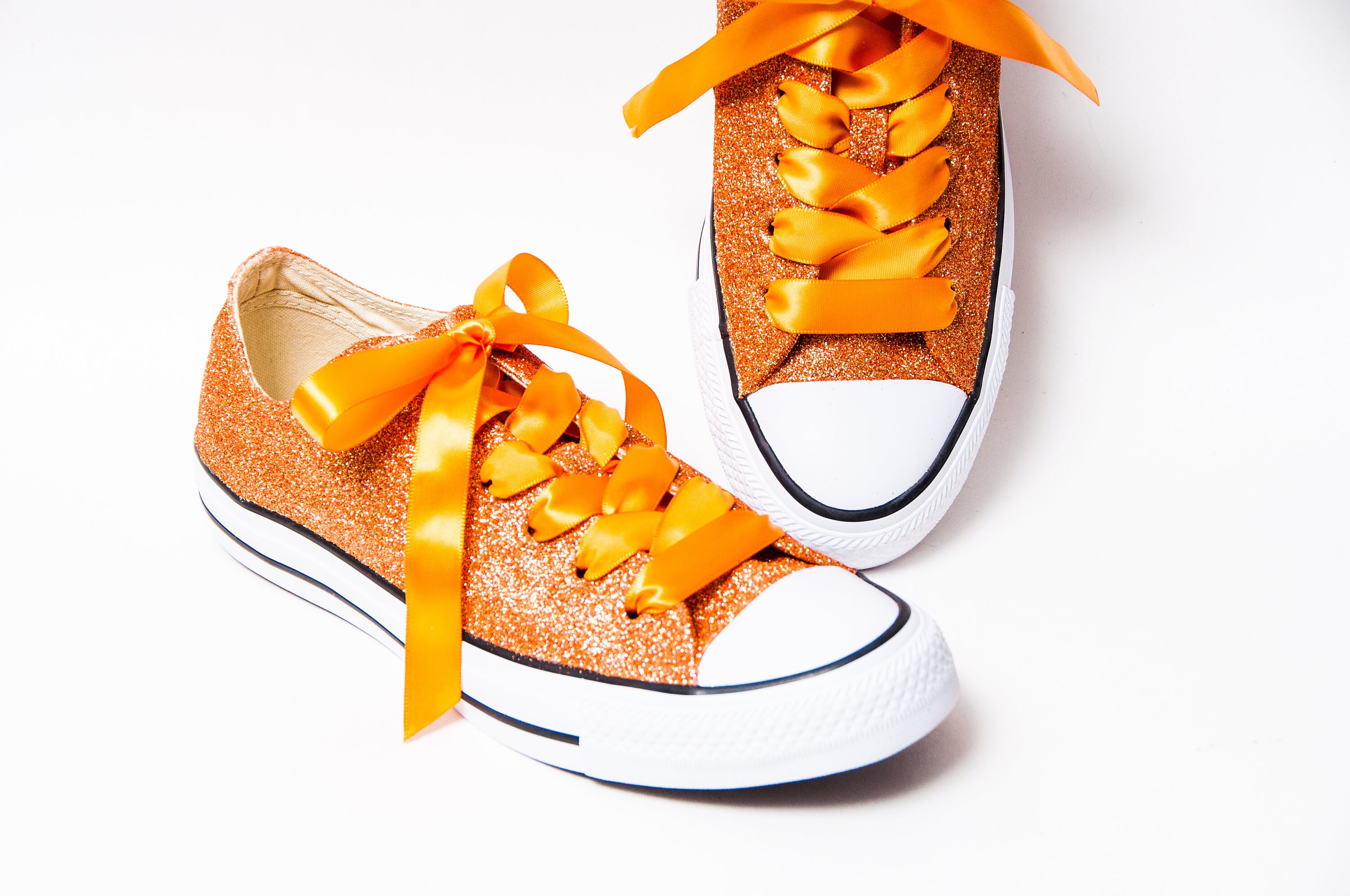 orange converse low tops