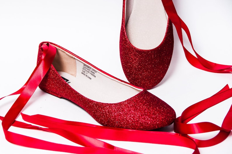 red sparkly ballet flats