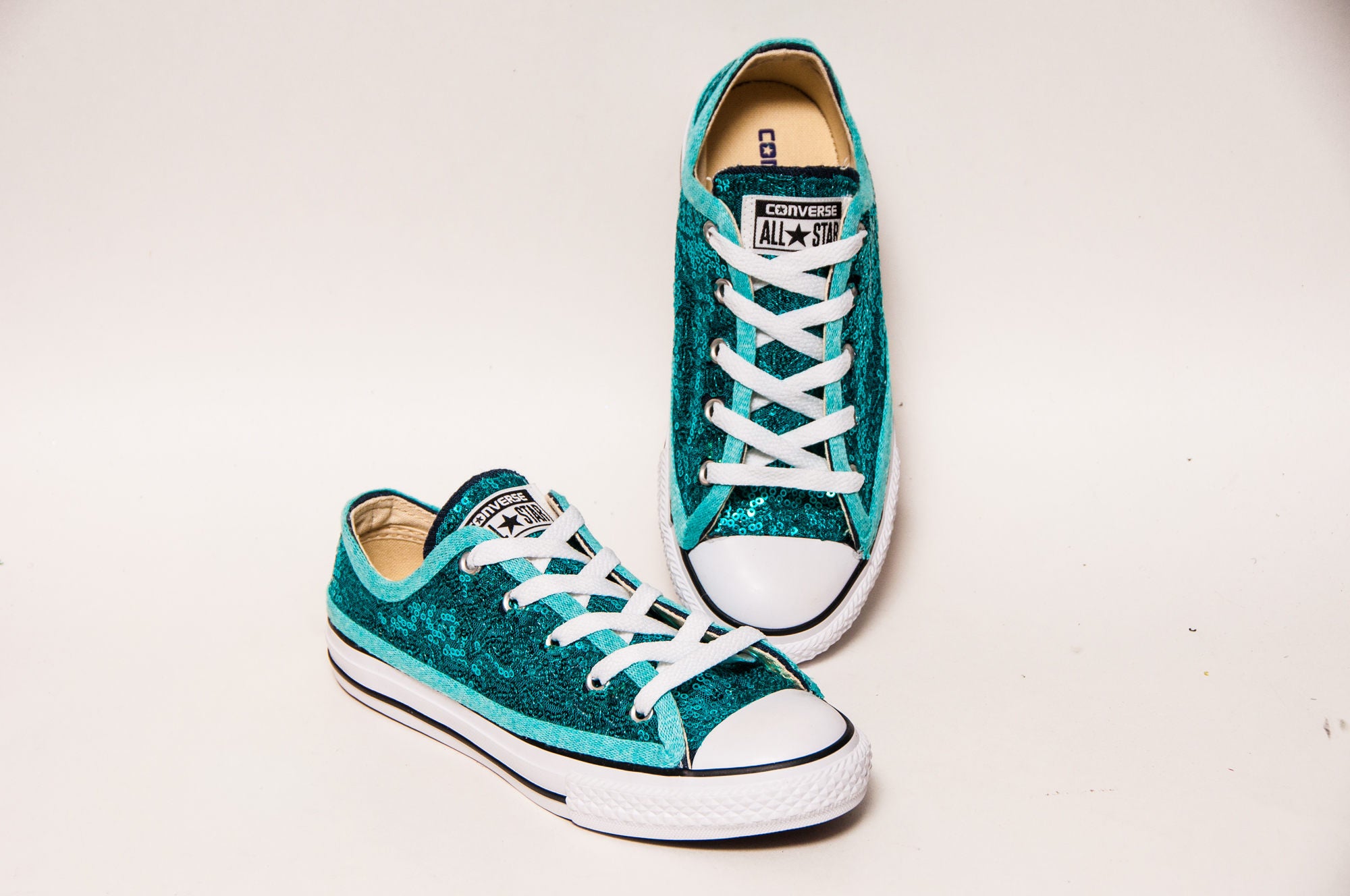 turquoise blue converse