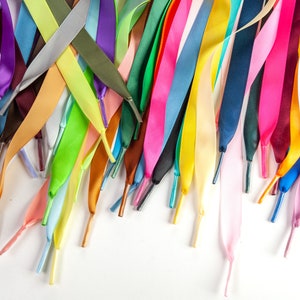 Individually handmade shoelaces made from quality single face satin ribbon at a 5/8", .375 inch, width. Over 75 different colors and lengths available: 36 inches, 48 inches, 54 inches, 63 inches, 72 inches, 96 inches.