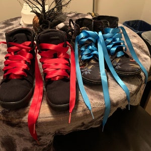 Individually handmade shoelaces made from quality single face satin ribbon at a 5/8", .375 inch, width. Over 75 different colors and lengths available: 36 inches, 48 inches, 54 inches, 63 inches, 72 inches, 96 inches.