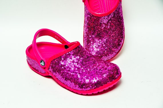 red sparkly crocs