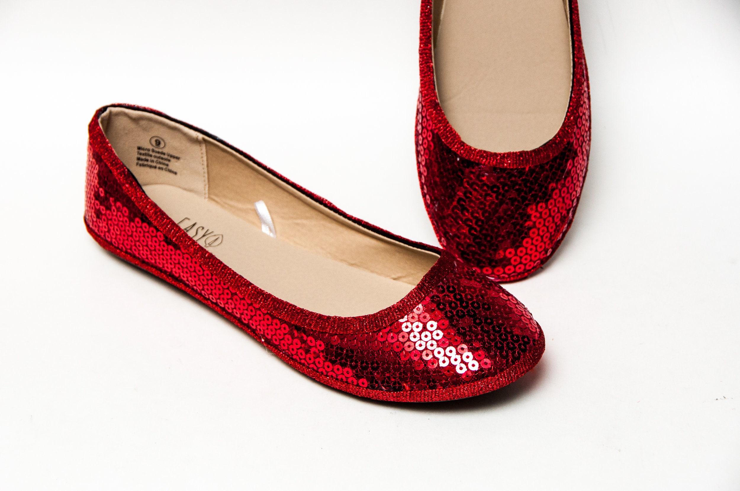 red sparkly ballet flats