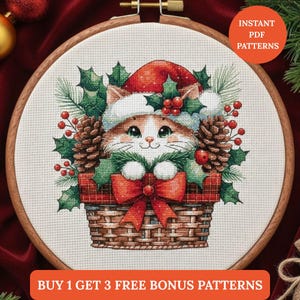 May include: Cross-stitch pattern featuring a cute cat wearing a Santa hat, nestled in a basket with a red bow. The design includes holly, pinecones, and berries, all set within a wooden embroidery hoop. Text reads "Instant PDF Patterns" and "Buy 1 Get 3 Free Bonus Patterns."