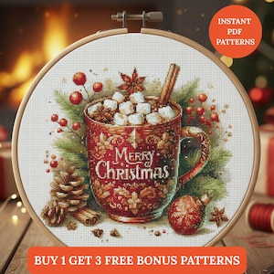 May include: A cross-stitch design in a wooden hoop features a festive Christmas theme. A red mug filled with hot chocolate and marshmallows is surrounded by pine needles, berries, and a cinnamon stick. The words "Merry Christmas" are displayed on the mug.