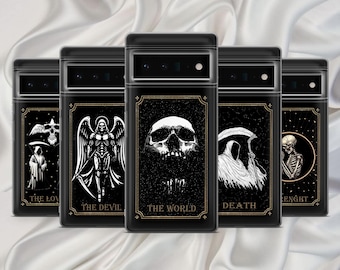 May include: A collection of black phone cases with gothic-themed designs. Each case features a different illustration, including a skull, angel, and Grim Reaper. The cases have gold borders and text labels such as "The World" and "Death".