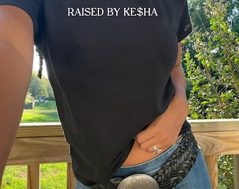 raised by Kesha baby tee. Raised by Kesha shirt. Kesha shirt. Girl shirt. hot girl baby tee. Kesha girl. Kesha fan. Cute tee