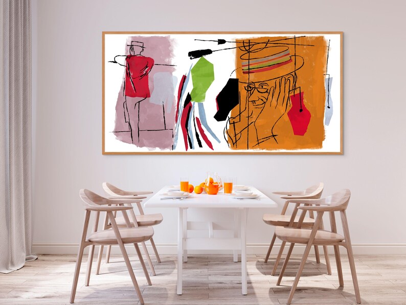 K&ouml;nnte beinhalten: Abstrakter Kunstdruck mit einem Mann, der einen Hut und eine Brille tr&auml;gt, in einem roten, orangefarbenen, gr&uuml;nen und blauen Farbschema. Der Druck ist gerahmt und h&auml;ngt an einer wei&szlig;en Wand &uuml;ber einem wei&szlig;en Tisch mit vier Holzst&uuml;hlen.