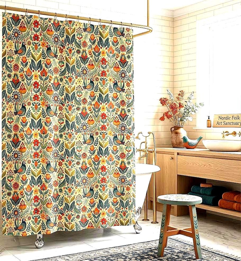 May include: A floral shower curtain with a cream background, featuring a repeating pattern of birds, flowers, and leaves in shades of orange, green, and blue. The curtain hangs in a bathroom with a white tub and wooden accents.