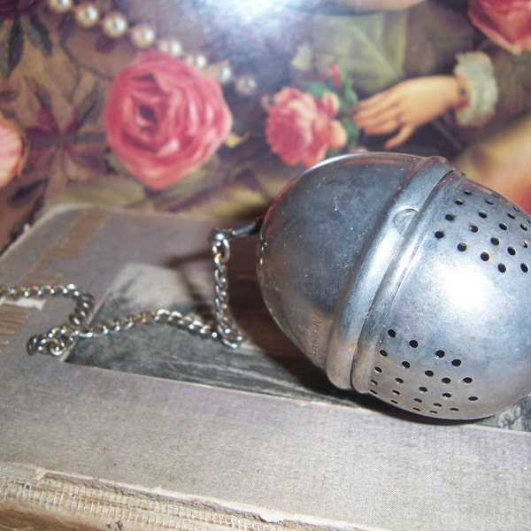 TEA FOR TWO A VINTAGE WEST GERMANY TEA STRAINER ON CHAIN