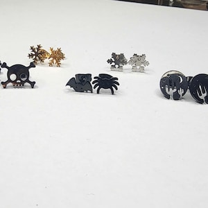 5 Varieties Stud Earrings: Silver or Gold Snowflakes, Black Skull Crossbones, Desert Landscape Night Scene Circle, Bat and Spider Mismatch