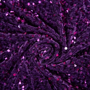 May include: Purple velvet fabric with a swirl pattern and small, iridescent sequins.