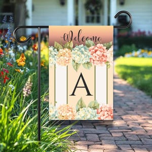 May include: A set of three ceramic mugs with a speckled, matte finish. Each mug features a different color: light blue, cream, and gray. The mugs have a simple, modern design and a comfortable handle.