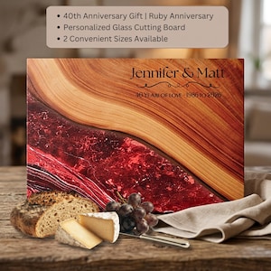 May include: A rectangular glass cutting board featuring a wood grain pattern on one side and a deep red, marbled resin design on the other. The board is engraved with the text Jennifer & Matt and 40 YEARS OF LOVE - 1986 TO 2026.